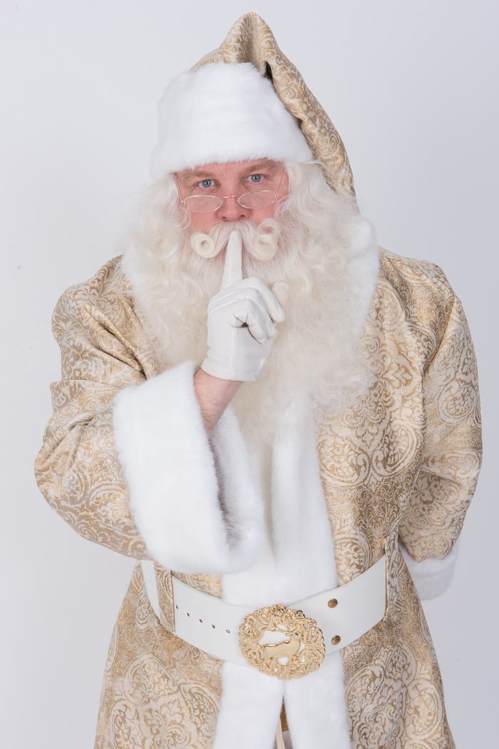 Santa Doug in a gold and white Heavenly Santa suit