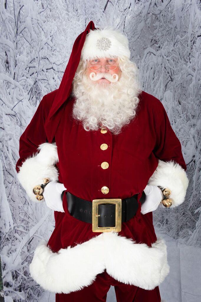 Santa Doug in a traditional Cola-style suit