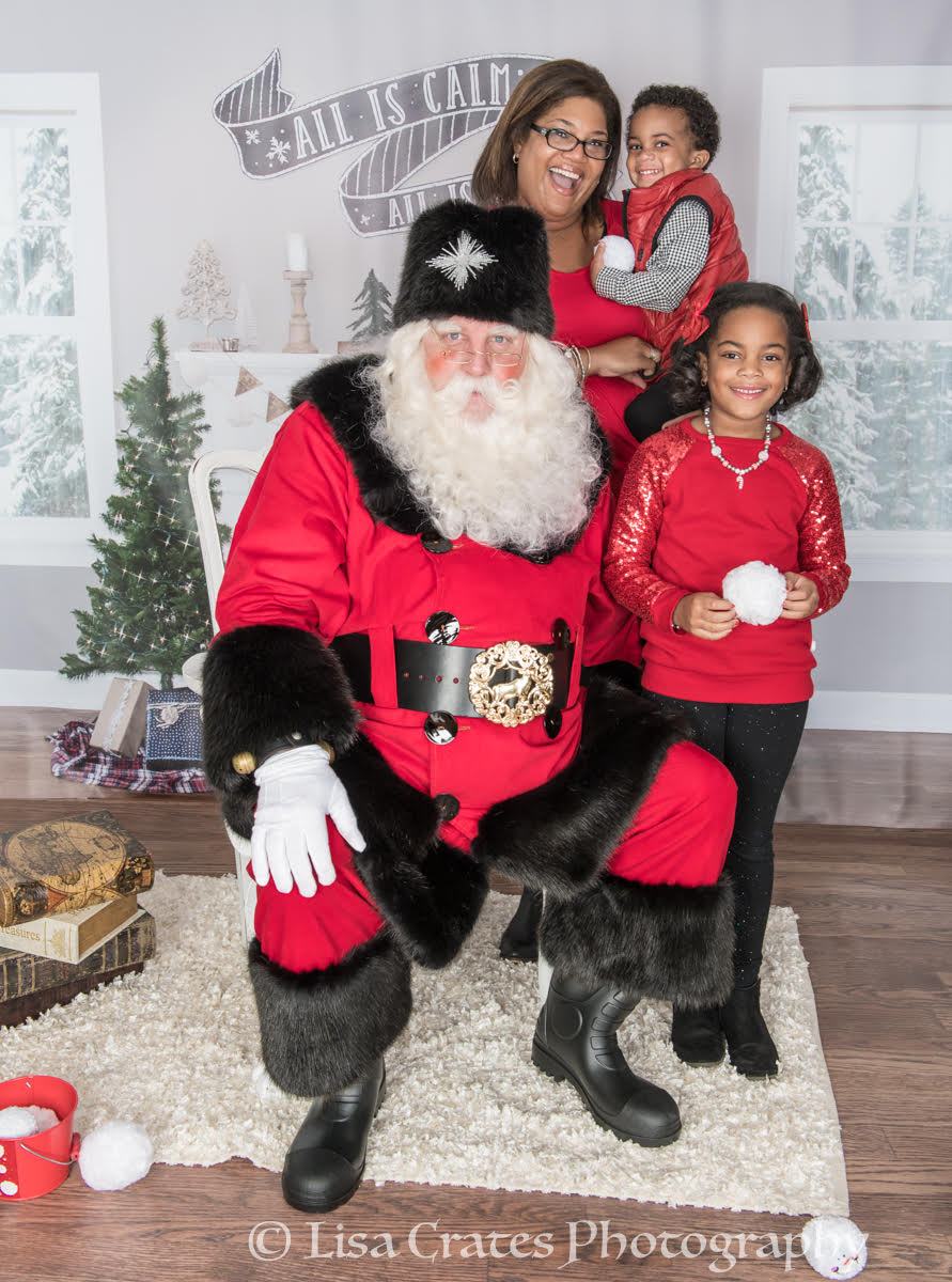 Santa Doug with a family of young believers